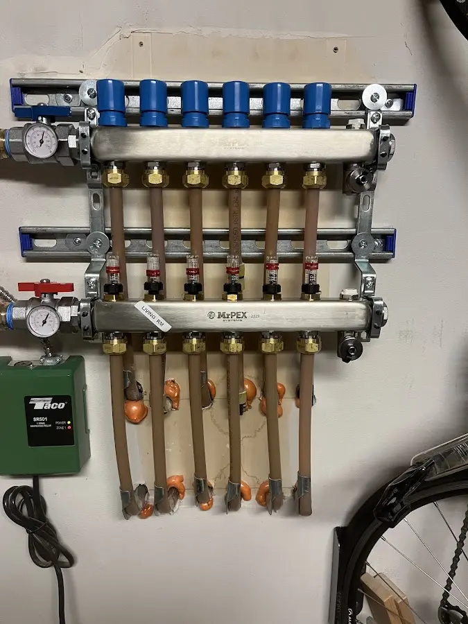 Plumber performing Water Heater Repair at a residential property in Melrose Park